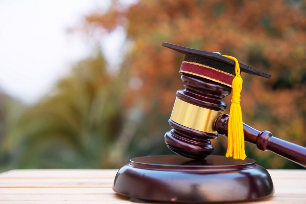Earn your graduation diploma hat through LegalFinders scholarship grant