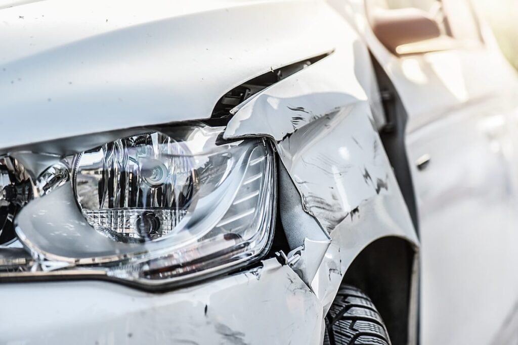 Close up image of a damaged car after a car accident.