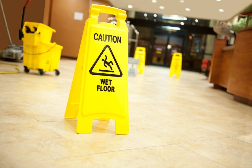 Wet floor sign to avoid slip and fall accident