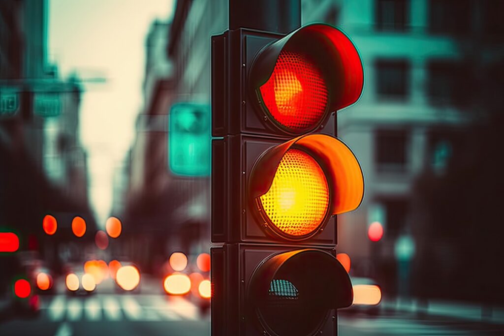 Close-up of a yellow traffic light signal on street