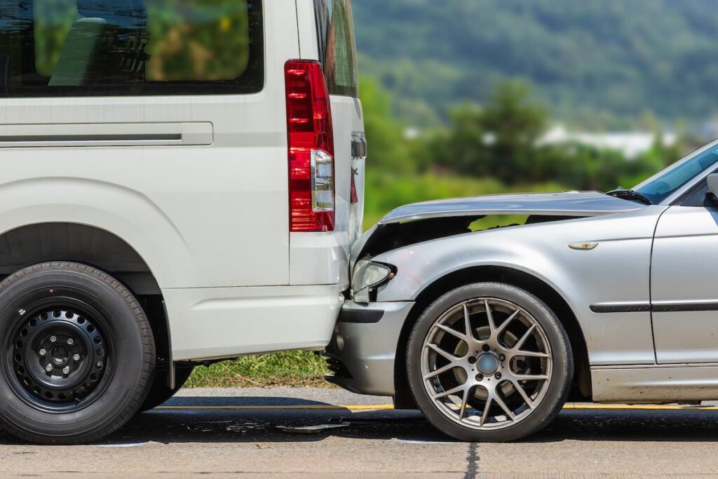 Rear-end car accident involving two cars on the road